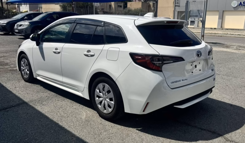 
								TOYOTA COROLLA TOURING Hybrid full									